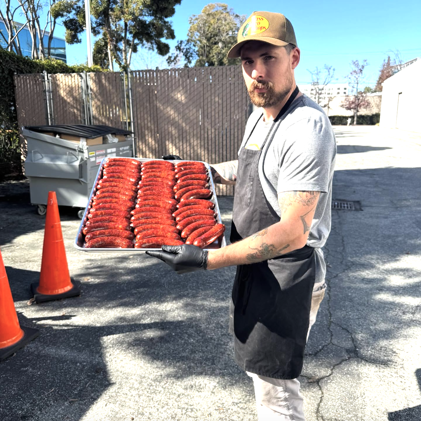 Pico's BBQ owner with house-made sausages